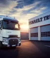 A Renault Trucks available and ready to go in front of a dealership